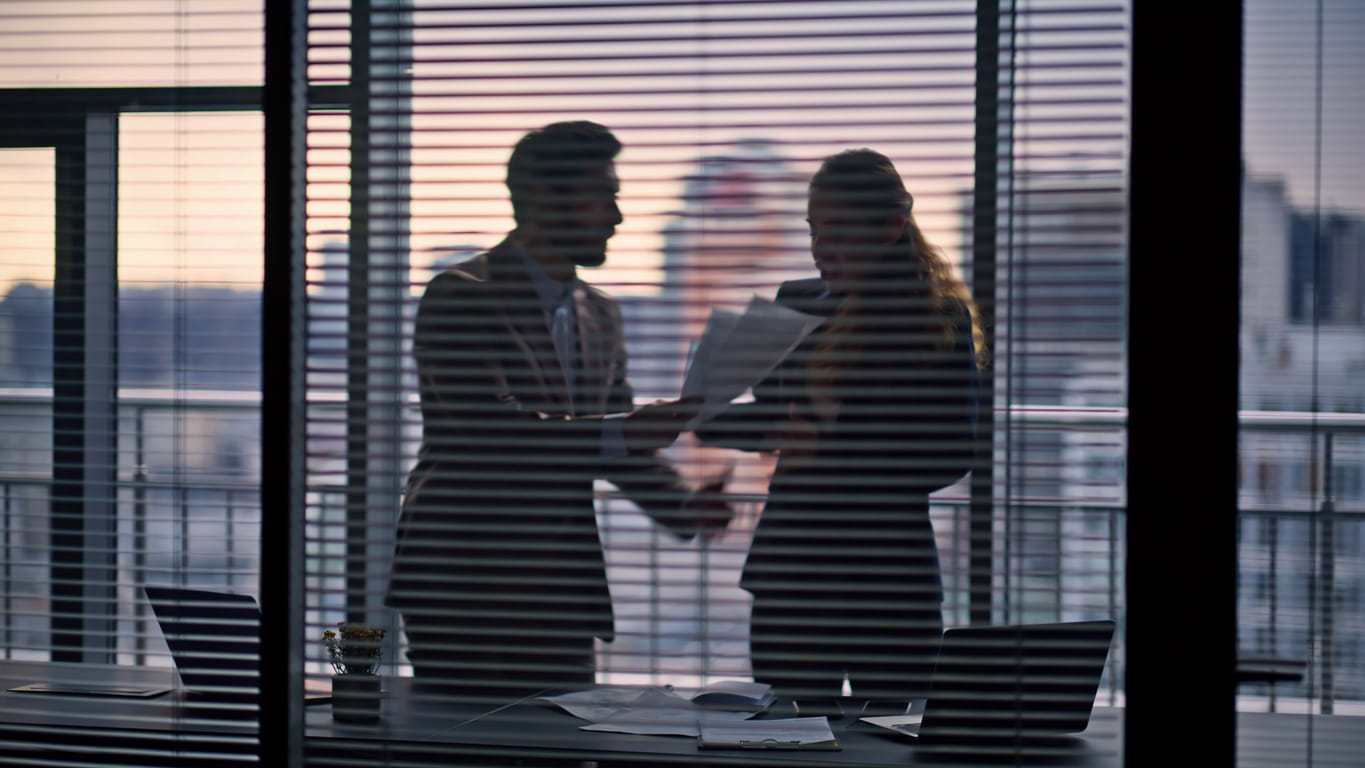 employees in a dark office